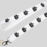 Schwarzes Kronenmuster auf weißem Lanyard mit Metallclip, zwei Schlüsseln; Schlüsselband liegt auf hellem grauem Hintergrund. Wertica Shop