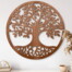 Holzuhr "Buche": Rund, mit filigran ausgeschnittenem Baum-Motiv. Perfekt als Wanddeko über Regalen oder Kommoden - stilvoll und naturnah zugleich. Wertica Shop